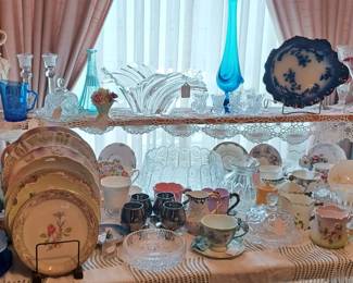 The china and glassware table in the dining room