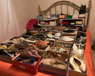 bed with 64 pairs of shoes.. and there is MORE