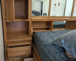 King Size bed with great under bed Storage built in Night Stands with Over head Lighting.