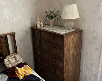 Dresser, which is one of a three piece bedroom set.