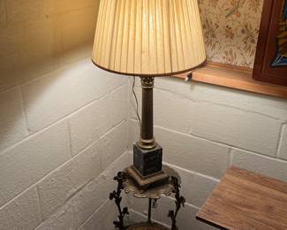 Metal plant stand staging lamp.