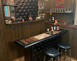 Portable bar with two matching barstools, hanging bar light, glass whiskey sign, bar paraphernalia and mirrors.