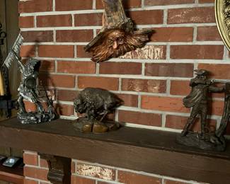 More vintage ceramic and iron figurines.