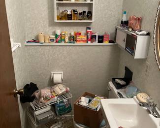 Bathroom supplies, including perfumes and colognes.