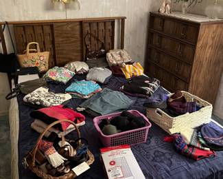 Women’s clothes, shorts, Belts, socks, Heating pad and full size bed.