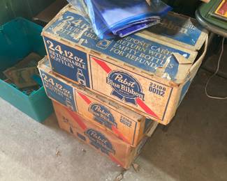 Pabst Blue Ribbon cases with bottles (some still unopened)