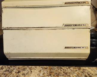 Vintage Kitchen Paper Towel, Foil and Waxed Paper Dispenser. No kitchen should be without one.
