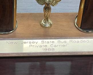 Assorted Trophies Awarded To DeCamp Bus Lines