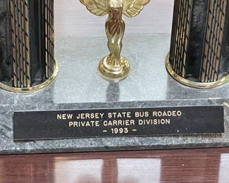 Assorted Trophies Awarded To DeCamp Bus Lines
