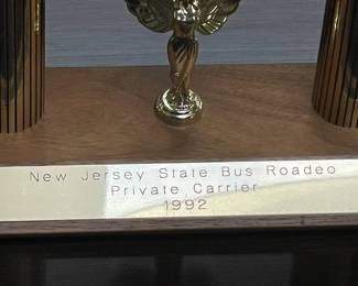 Assorted Trophies Awarded To DeCamp Bus Lines