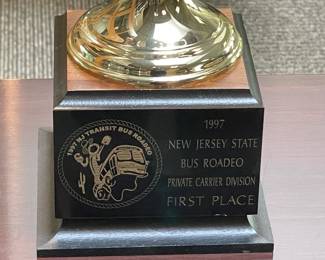 Assorted Trophies Awarded To DeCamp Bus Lines
