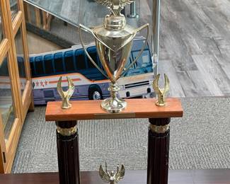 Assorted Trophies Awarded To DeCamp Bus Lines