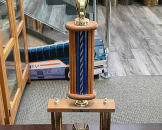 Assorted Trophies Awarded To DeCamp Bus Lines