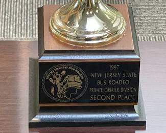 Assorted Trophies Awarded To DeCamp Bus Lines