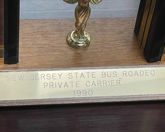 Assorted Trophies Awarded To DeCamp Bus Lines
