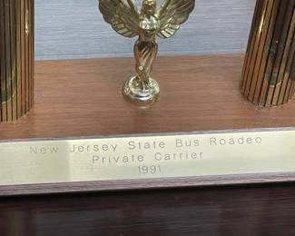 Assorted Trophies Awarded To DeCamp Bus Lines