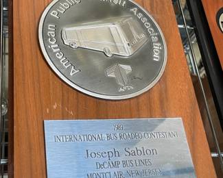 Assorted Award Plaques Awarded To DeCamp Bus Lines