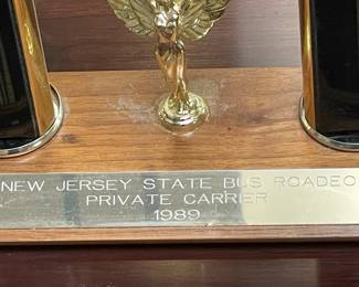 Assorted Trophies Awarded To DeCamp Bus Lines
