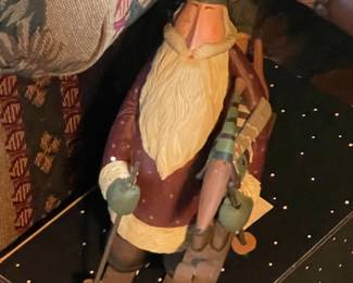 Santa Riding Skiis Figurine