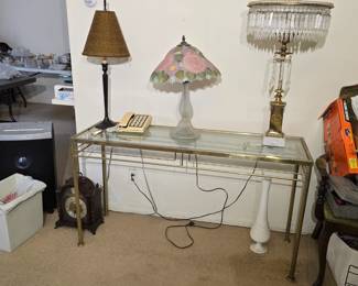 Rare Vintage, Mid-Century Glass Entertaining Side Table (available with matching Bar table)
$500 ---- Beautiful vintage entertaining piece. What a rare find! Get both pieces (this and the matching Bar Cart) together. This side table is about 4' wide and has a glass top adorned by an elegant metal design. Don't miss out!