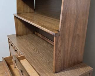 This beautiful hardwood set of matching pieces is a great value. They are made of walnut and elm. The dresser and chest of drawers have semi-hidden drawers with beautiful detailing that make them not appear to be drawers. The pieces come with original, vintage hardware (note: one handle is broken so you may want to repair/replace).
Dimensions:
1) Dresser: 54"w x 30.5 x 17.75D
2) Hutch/Top/Bookshelf: 44 x 46 x 13.5D
3) Chest of Drawers: 36w x 41" x 18D