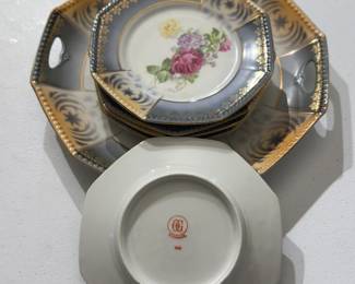 Vintage beautiful set of OG Otto Grunert porcelain rose serving and dessert plates- Germany --- Vintage Fine German China: One dessert serving plate with six dessert saucers. Five of the saucers are mint condition and one saucer is chipped and has a long crack across the middle.