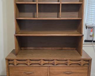 This beautiful hardwood set of matching pieces is a great value. They are made of walnut and elm. The dresser and chest of drawers have semi-hidden drawers with beautiful detailing that make them not appear to be drawers. The pieces come with original, vintage hardware (note: one handle is broken so you may want to repair/replace).
Dimensions:
1) Dresser: 54"w x 30.5 x 17.75D
2) Hutch/Top/Bookshelf: 44 x 46 x 13.5D
3) Chest of Drawers: 36w x 41" x 18D