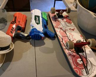 Punisher skateboard, nerf zombie strike gun, X shot water gun