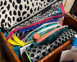 Lots of cosmetic bags