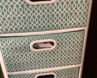 Two sets of three drawer storage