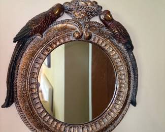 English giltwood round bullseye convex mirror with an eagle crown top