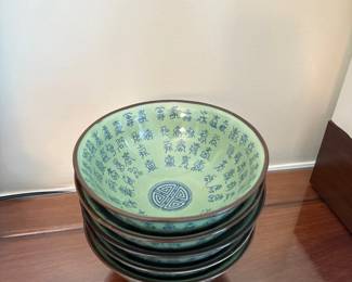 Xuande celadon bowls with chinese calligraphy and longevity symbol