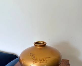 flattened porcelain sphere vase with golden finish and bird design
