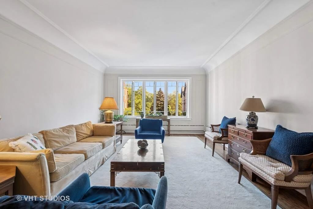 Sofa, MCM cane chairs, large white rug with some marking 16’7” x 10’ 8”