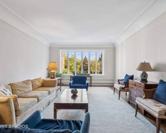 Sofa, MCM cane chairs, large white rug with some marking 16’7” x 10’ 8”
