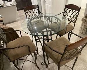 Bar height glass table with 4 chairs