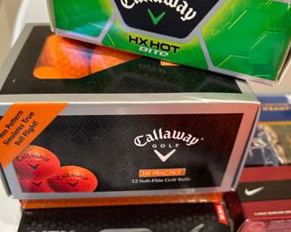 GOLF BALLS—- lots of them NIB.