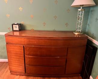 MCM bow front Side Board. 60 wide by 21 deep by 35 tall. Excellent condition. Available for pre-sale