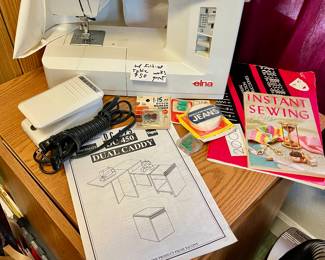 Nice working sewing machine $50 comes with books manuals fold up and fold out table with directions