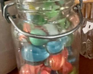 Jar of vintage marbles $10 with boulders and cat eyes