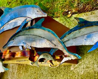 Yard art jumping fish $25
Or wall art