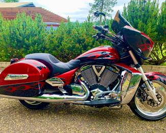 2011 Victory Cross Country touring bike, custom paint job, very low mileage 7k , has a trunk also , Excellent condition will not be at the sale. Contact me to see asking $10,500
