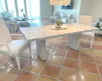 $3,200 Designer Palecek dining table, seats 6. (New, this table likely sold for $10,000+) This is from the Camilla Collection and features fossilized clam shale top with a natural edge, and a chiseled “stone” base. Piece separates into three pieces and weights a combined 286 lbs. Dining table comes with 6 chairs – (2) Lexington Home dining chairs with arms, (2) Arhouse traditional dining chairs, and (2) Arhouse high back padded chairs – all in off-white. Some upholstery marks.