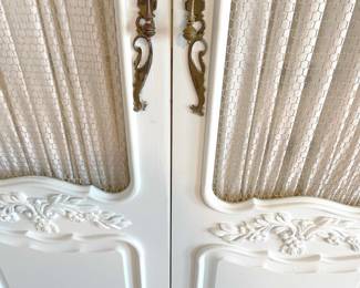 The outer doors have a very pale blue paint finish in the Shabby Chic style, with fine metal grill inset with gathered curtain on rod interior. Total measurement is 83”W x 21”D x 84”H.