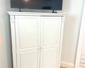 $100 Corner armoire refinished in the Shabby Chic style in very pale blue
25”W x 42”D x 54”H