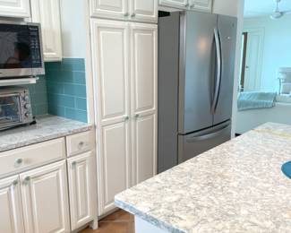 $600 OBO Kitchen cabinets – uppers and lowers -- are a combination of old cases and new doors with pretty, blue sea glass cabinet pulls. Upper set includes (2) single (right and left), (1) corner cabinet, (1) over microwave set, (1) over kitchen set. Measurements available upon request.