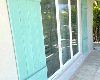 $50 Pale green decorative shutters (4) 21”W x 76”H.