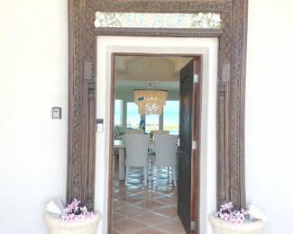 $500 Bali carved door arch. Center inset reads “Peace” in seashells. Beautiful carving, hardwood. Outer dimensions: 67” W x 7” D x 85”H. Inner dimensions: 48”W x 7”D x 68”H.