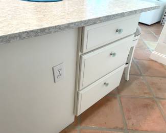 $600 OBO Kitchen island, 63”W x 45.5”D x 36”H including marble top – white with blue vein & “diamond” accent. Island box features six drawers and (1) double cabinet with roll out drawers.