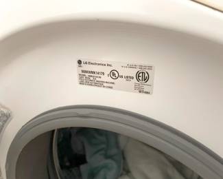 $100 LG front loader washer, year 2009, some rust (model # WM2010CW)